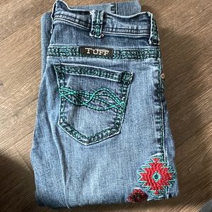 Cowgirl tuff, never give up jeans